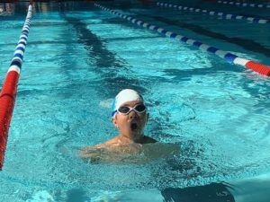 Swimmer taking a breath.