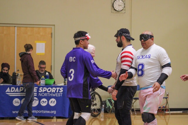 Athletes shaking hands at an ASNW event.